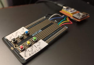 A picture of the receiver board with extra buttons attached.